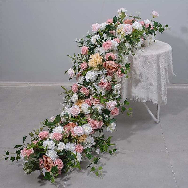 Luxury Peach & Blush Pink Wedding Flower Row with Realistic Silk Greenery Premium 2-meter mixed silk flower runner featuring peach, blush pink, and white roses blended with realistic eucalyptus greenery cascading off a table.